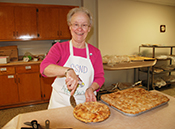 Serving up apple pie at the annual Craft Fair and Garage Sale