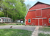 A photo of the house and barn house at Lil' Farm in Cambridge, Minnesota. 