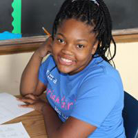 A student studies at Marian Middle School in St. Louis. 