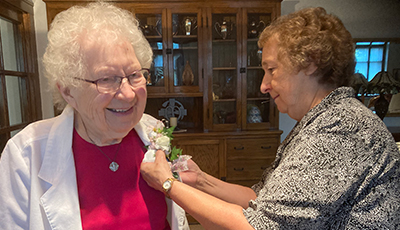 Sisters an Our Lady of Good Counsel, Mankato, Minnesota, celebrated Jubilee 2021. This photo is of a Jubilarian getting a flower pinned on. 