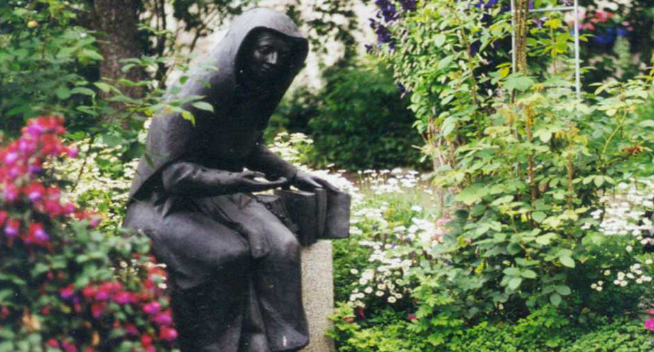 A statue of Blessed Theresa in a garden in Germany