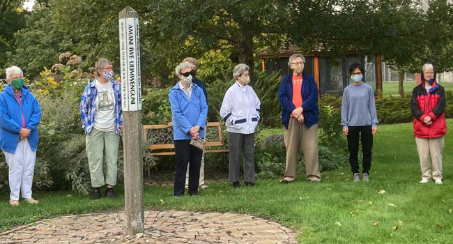 2020 Prayer for Peace. Sisters at OLGC gathered around the Peace Pole on the International Day of Prayer for Peace for a simple, socially-distanced, masked prayer service.