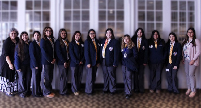 Sister Bridget Waldorf, left, with students at Cristo Rey in Dallas