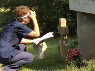 Janice Taulli-Lasseigne reviwing tombstones at the Chatawa Cemetery. Photo by Tina Convington