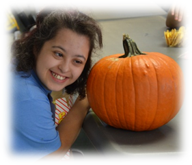 Notre Dame School Student with Pumpkin