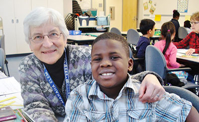 Sister Audrey Lindenfelser with a student at East Side Learning Center in St. Paul, Minnesota. 