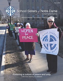 The SSND Newsletter Vol. 2 2021's cover shows sisters stand in solidarity with high school students during a national school walkout calling for more action against gun violence.