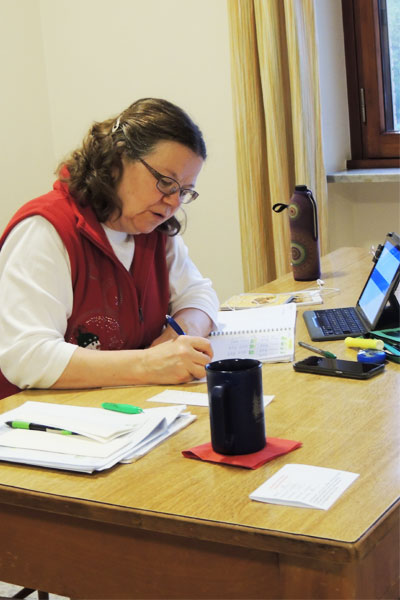 Sister Jean Greenwald moved to the Generalate in Rome early 2020 from Sancta Maria in Ripa in St. Louis. she is photographed working at her desk at the Generalate. 