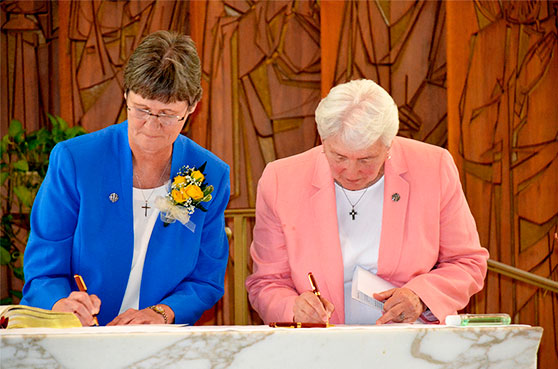 This photo is of Sister Joan Pikiell, (eft) who maked her final vows in Wilton, Connecticut on August 7, 2021 in the Atlantic Midwest Province.  