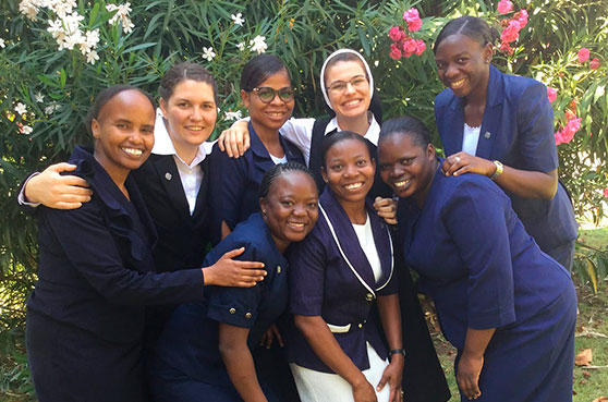 Eight of the nine new SSND who made their first profession in Rome, July 2020.  