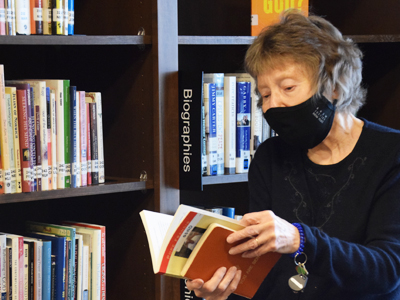 Sister Suzanne Moynihan is passionate about the Care of Creation and thus joined the recently formed Laudato Si’ Care of Creation Committee. She is featured reading in this photo.