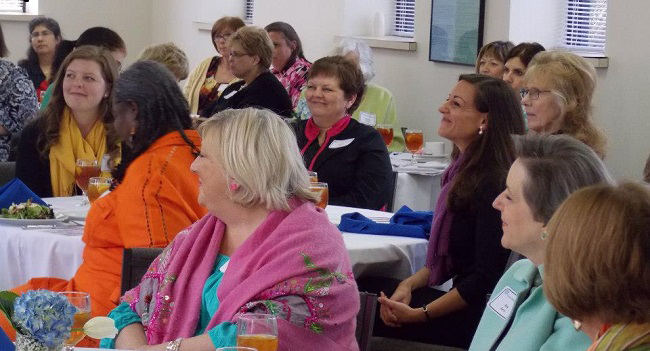 Women's Leadership Luncheon attendees in Dallas enjoying the speaker presentation.