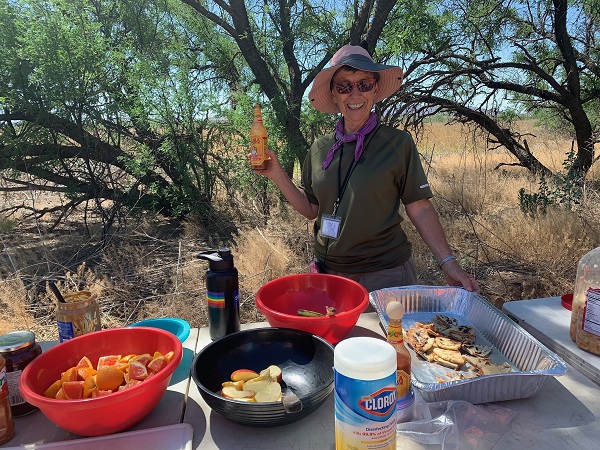 Sister Judy Bourg prepares food along the Migrant Trail as they complete their 75 mile trek.
